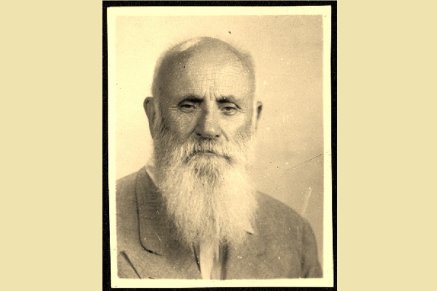 Fotografía en primer plano, sepia de José Belloni con su típica barba larga.