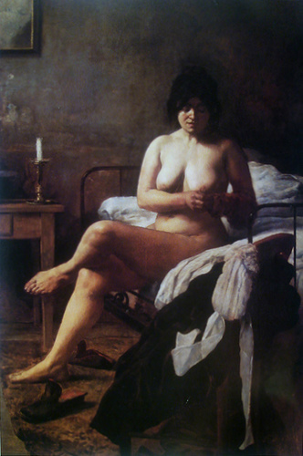 Mujer desnuda sentada en la cama