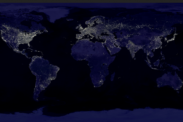 Foto desde el espacio que muestra los continentes y su distribución luminosa en la noche