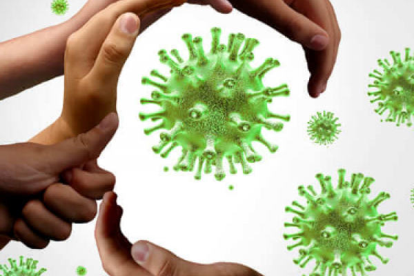 Manos rodeando imagen de un virus