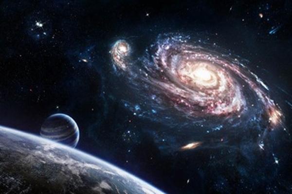 Imagen del espacio, se ve una galaxia así como otros objetos astronómicos.