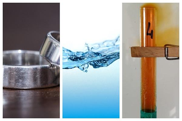 Imagen en la que se observa un anillo metálico, agua y un gas desprendiéndose de una reacción química