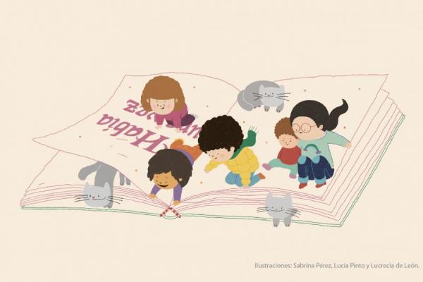 Imagen de ilustraciones de niños sobre un libro abierto.