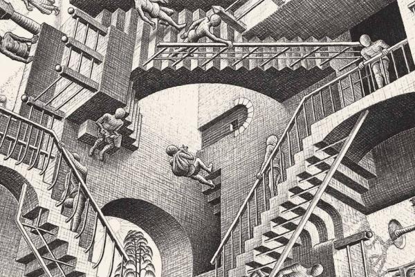 Espacio con escaleras que suben y bajan en blanco y negro